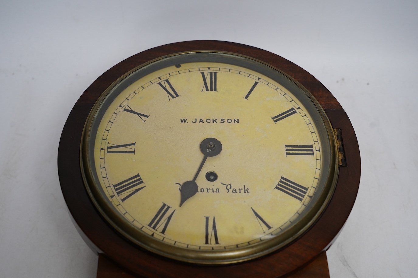 A Victorian mahogany drop dial eight day wall clock, signed Jackson, Victoria Park. 30cm, with key. Condition - fair. Not tested as working